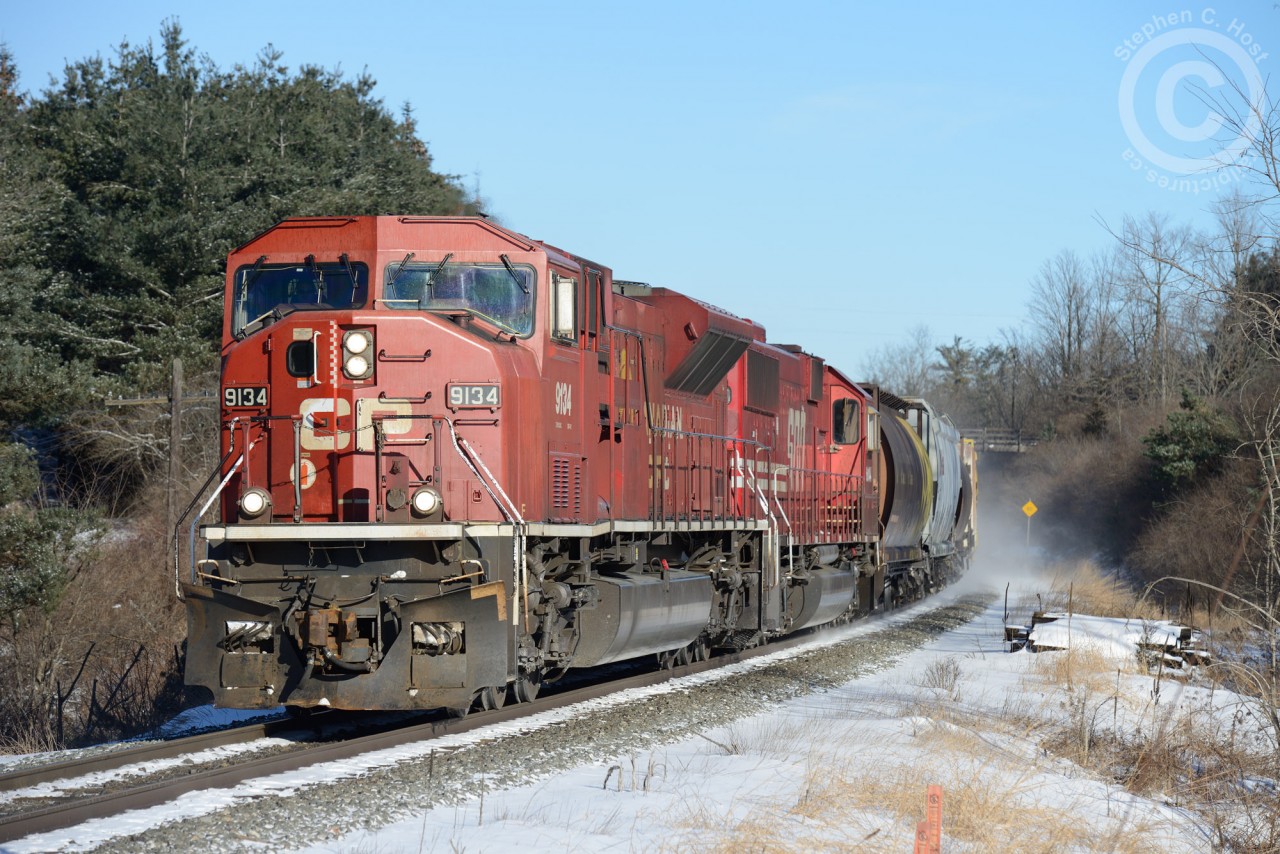 CP train 301-01, with SD90MAC 9134 and SOO 6044 are detouring south via the US due to congestion on the northern route.