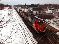 [Editors note: Submitted by our youngest contributor, at 9 years old] CN 5420 leads BNSF 5021 and BNSF 1123 through Woodstock with train 385 and 144 cars in tow. This is the third time I have seen BNSF power on CN, for a total of 6 locomotives. Thanks Dad for bringing me out to shoot it. 