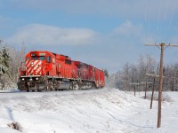 With all hope being lost on shooting a southbound train on the MacTier Sub, my scanner crackled to life when CP 6037 S called the Palgrave mileboard. CP6037 and CP9595 lead CP 420 through Palgrave on this nice winters day.