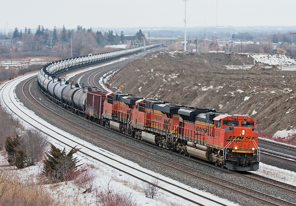 SWOOSH : A trio of BNSF units lead an eastbound crude oil train on the Kingston Sub.