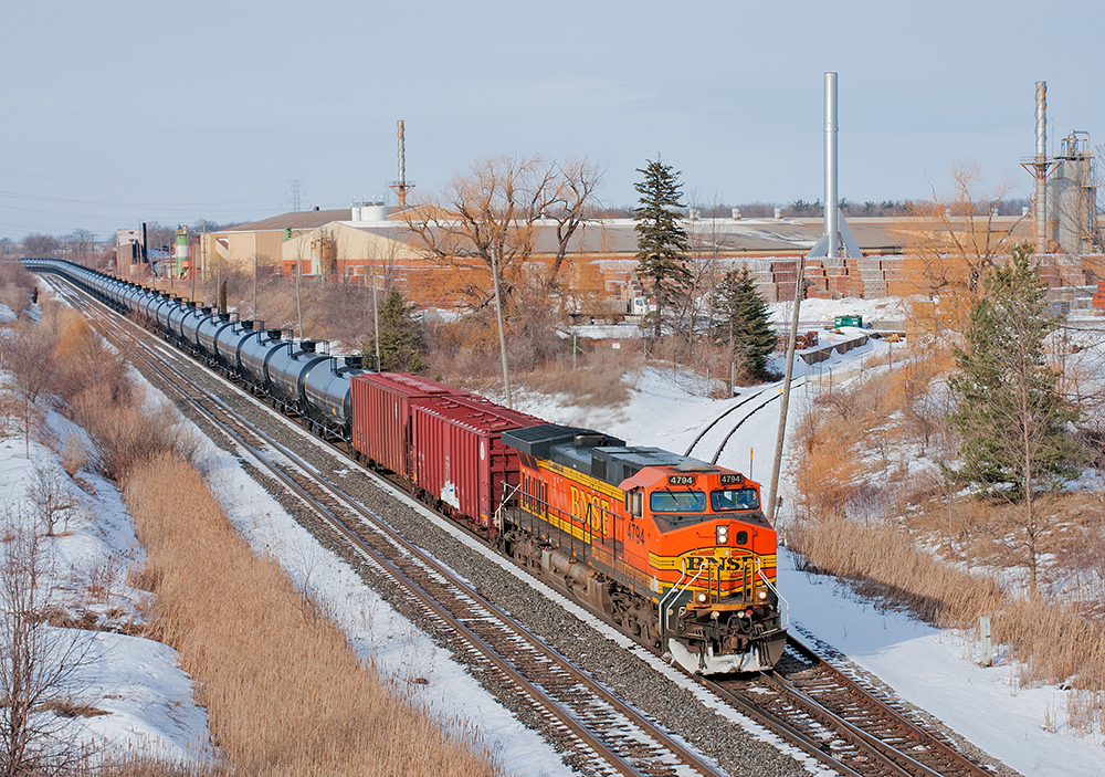 Flying solo, BNSF 4794 West has this empty crude oil train well in hand.