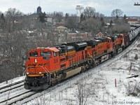 CN crude oil train 710 snakes through the town of Napanee behind BNSF 9206, 7225, and 6687. 1509hrs.