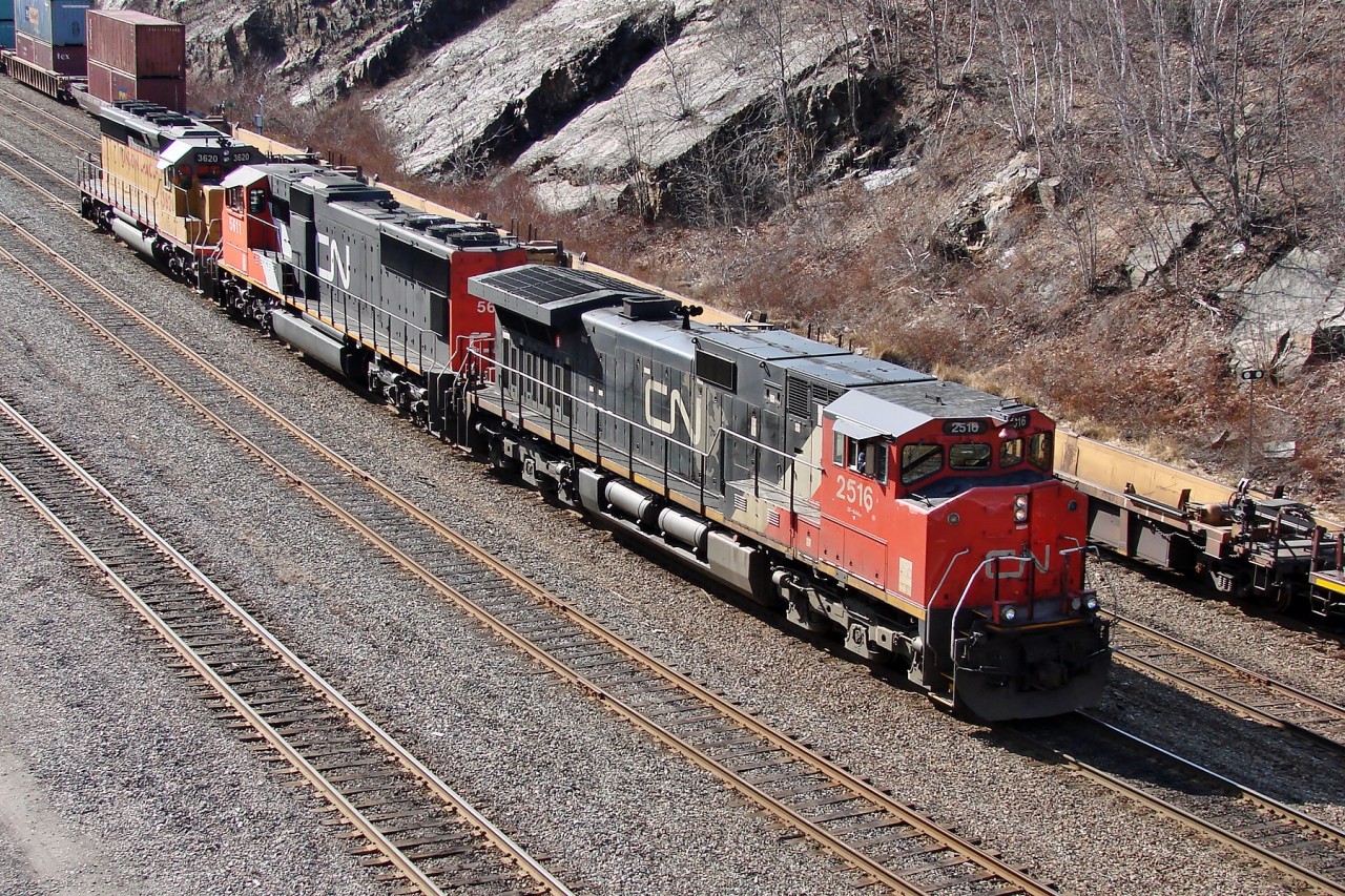 Dash 9-44CW 2516, SD70I 5611, and UP SD40-2 3602 make a light engine move from Halifax Ocean Terminal Yard to Fairview Yard.