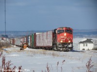CN 316 approaching Grandview Main Street Crossing with 2231, DP 2854 with 105 cars.