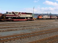 CN 4760 and 4724 work Rockingham Yard while broad guage EFC - Estrada de Ferro Carajás SD70M 740 waits to be delivered to Halifax Ocean Terminal Yard for shipment to Brazil.