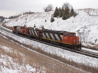 A matched pair of zebra's are the power for CN's Teddy Bear Express today. The conductors in training ran light to Oshawa and back and did a few roll by inspections at Liverpool. There was about 6-8 guys packed into the cab of the trailing unit! Numbers are 4777-1412-4760.