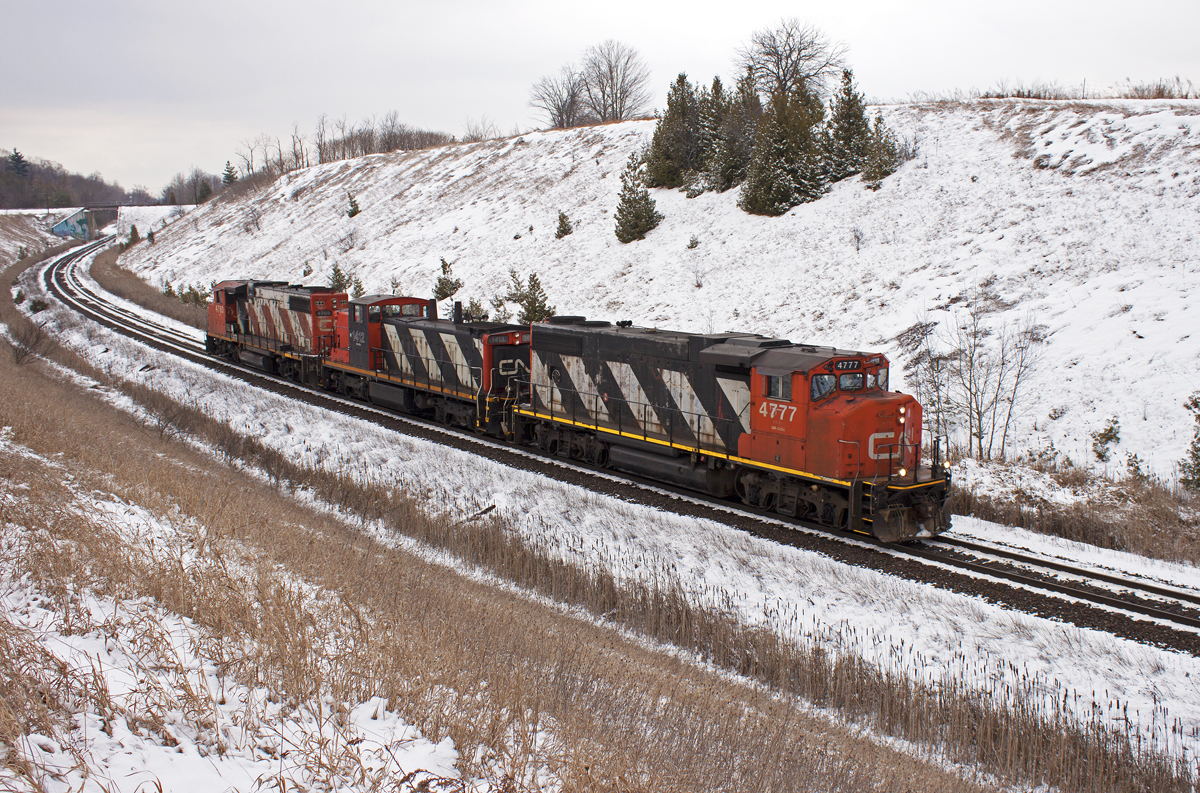 A matched pair of zebra's are the power for CN's Teddy Bear Express today. The conductors in training ran light to Oshawa and back and did a few roll by inspections at Liverpool. There was about 6-8 guys packed into the cab of the trailing unit! Numbers are 4777-1412-4760.
