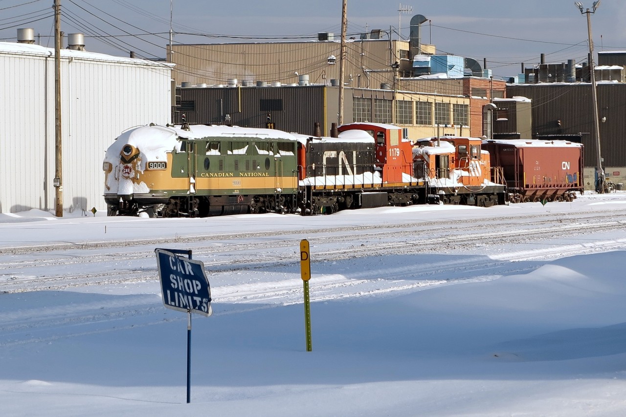 Ex-CN F3A 9000 along with ex-CN/NAR GMD1m 1179 and ex-Altasteel/Stelco GE 80T 52 parked at CN's Walker Yard. These locomotives are currently owned by the Alberta Railway Museum.