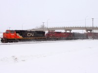 CN 5686 leads CP 9500 and F unit RPCX 6311 through Portage. The F unit is all likely heading for a museum somewhere in western Canada.