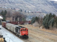 CN (WC) #3027 & CN (IC) #3140 continue their journey toward the Okanagan Subdivision. The former operator, Kelowna Pacific Railway, filed for bankruptcy in July 2013.