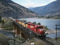 A rare combination especially for the "West."  2 MK rebuilt SD45's (SD40R) leads a pair expatriated UP SD40-2's across a tributary of the Thompson River.  Unfortunately, these days are gone..  Now legions of GE's have taken up the task.
