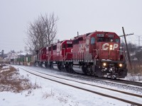 After rotting on the main at Neilsons for almost three hours, CP 240 finally makes its way out of Toronto for their trip to Smiths Falls. Consist is 6009-6251-6241-9593. 
