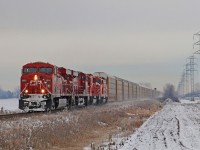 CP 8885 with trailing units CP 8855, 6223 and 9014 power train 147 westward at mile 98.8 on the CP's Windsor Sub.