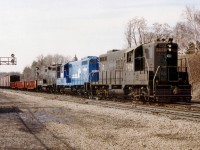 I have forgotten why a Conrail-powered train was out of TH&B Aberdeen Yard in Hamilton on this particular day, running at a time (1030 am)not all that common with the railroad; I wondered if it was a Toronto-bound "Starlight". CR 7431, 5820 and 3819, probably Canadian Division locomotives, power this train. Note the trailing unit does not have a cab.  (I had seen this loco on transfers at Fort Erie the odd time as well back then.) There were 76 cars, CP van 434062 on the tail and a smattering of surprised railfans around as well.