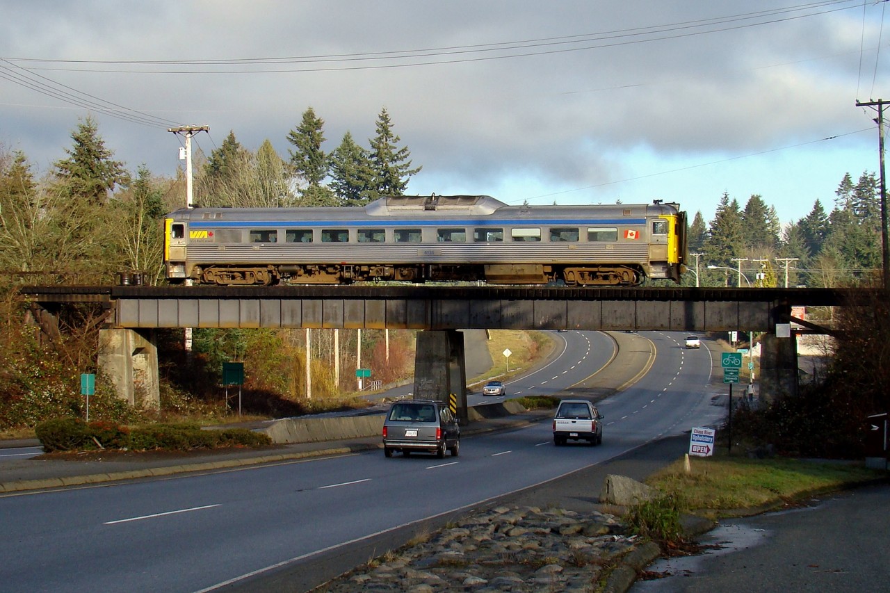 Re-routed VIA Malahat crosses the Trans-Canada Highway on its way to the station in Nanaimo. VIA trains between Nanaimo and Victoria where cancelled after SRY closed the Esquimalt Sub south of Duncan due to flooding from the Cowichan River.