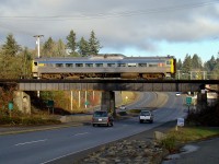 Re-routed VIA Malahat crosses the Trans-Canada Highway on its way to the station in Nanaimo. VIA trains between Nanaimo and Victoria where cancelled after SRY closed the Esquimalt Sub south of Duncan due to flooding from the Cowichan River.