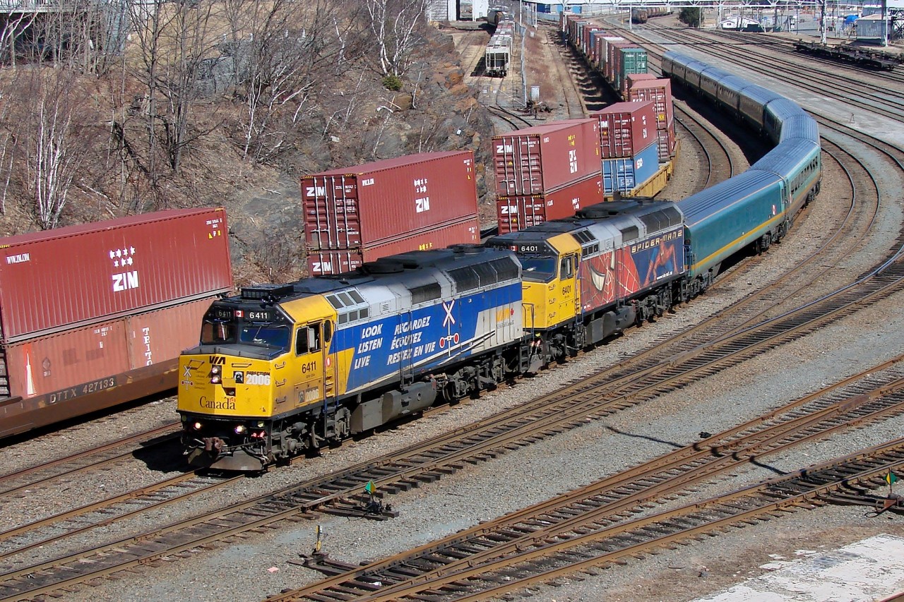 Operation Lifesaver 6411 and Spiderman 2 6401 lead the westbound Ocean out of Halifax.