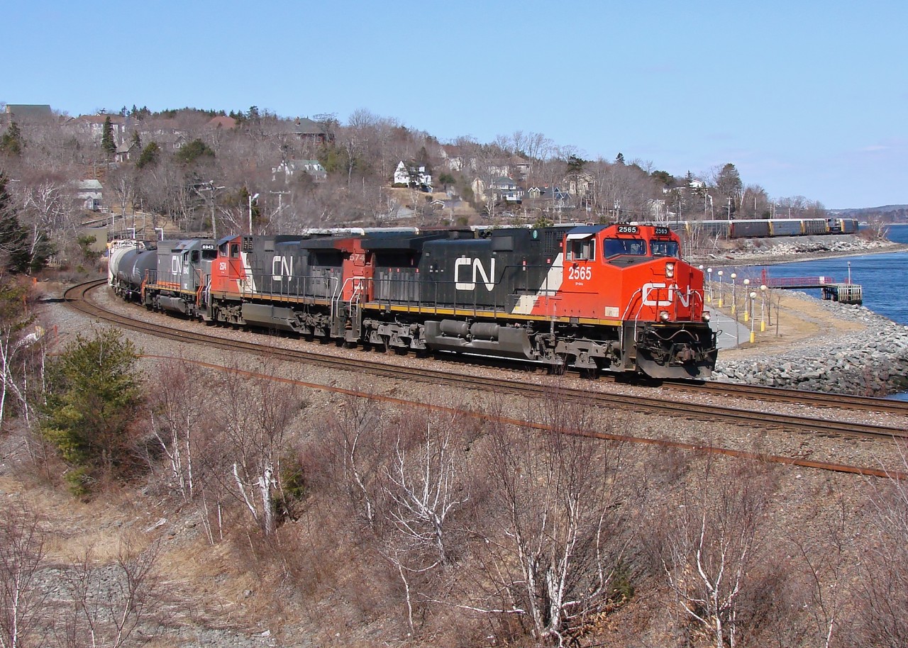CN 2565, CN 2574 and WC 6943 lead CN 148 into Rockingham Yard.