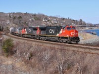 CN 2565, CN 2574 and WC 6943 lead CN 148 into Rockingham Yard.