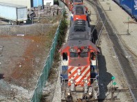 BC Rail SD 40-2s 762 and 746 with CN GP38-2 4716 lead CN 510 through New Westminster en-route to CN's Thornton Yard.