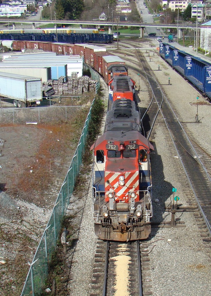 BC Rail SD 40-2s 762 and 746 with CN GP38-2 4716 lead CN 510 through New Westminster en-route to CN's Thornton Yard.