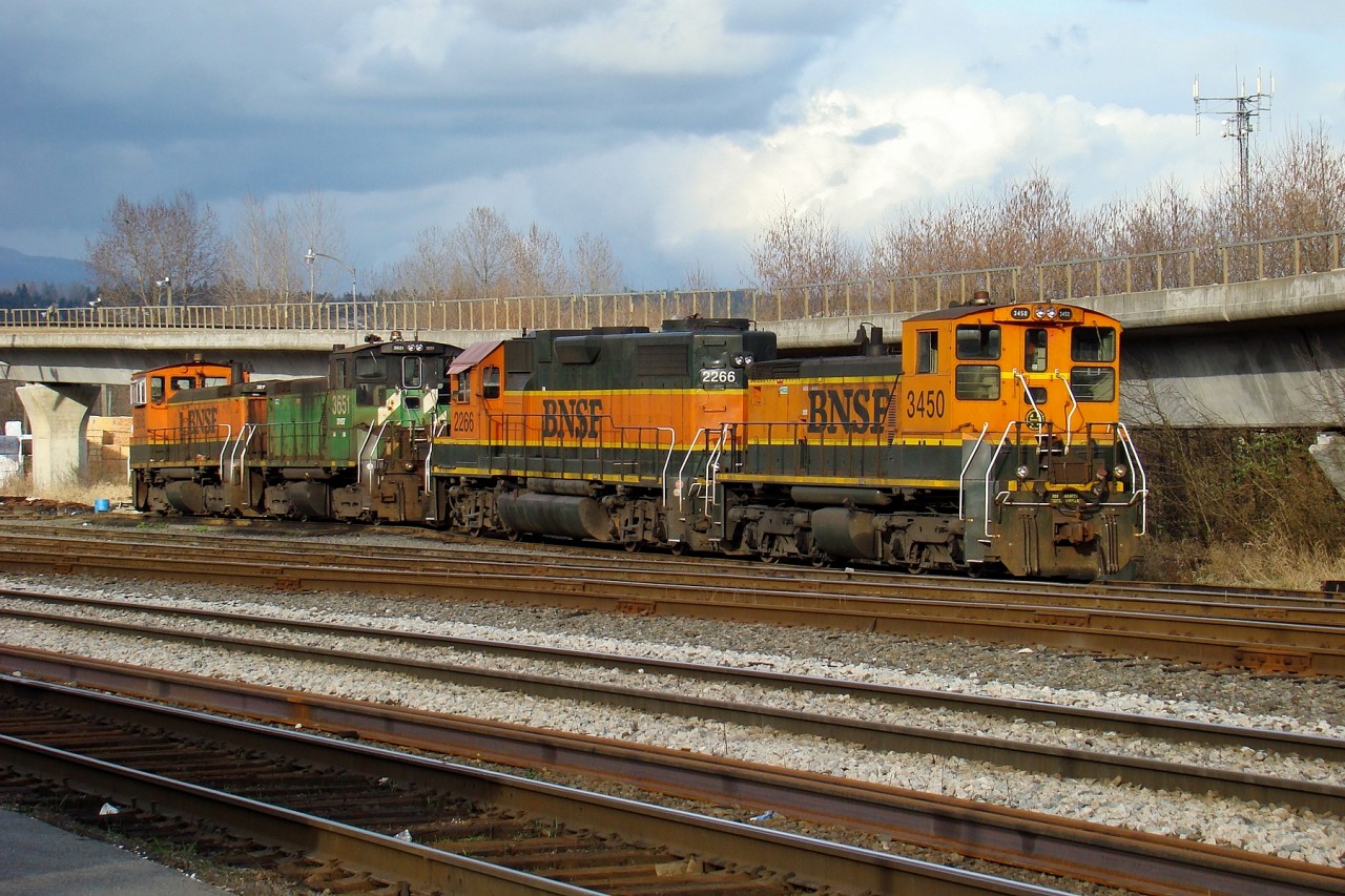 SW1500 3450, GP38-2 2266, and SW1000's 3651 and 3616 parked at BNSF's New Westminster depot.