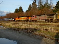 BNSF Dash 9-44CW 4763 leads MPASVBT through the west siding at Brownsville as it passes AMTK 517 waiting to head south to the US.