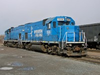 Former Conrail GP15-1's leased to the Cape Breton & Central Nova Scotia Railway idle by the yard office in Stellarton.