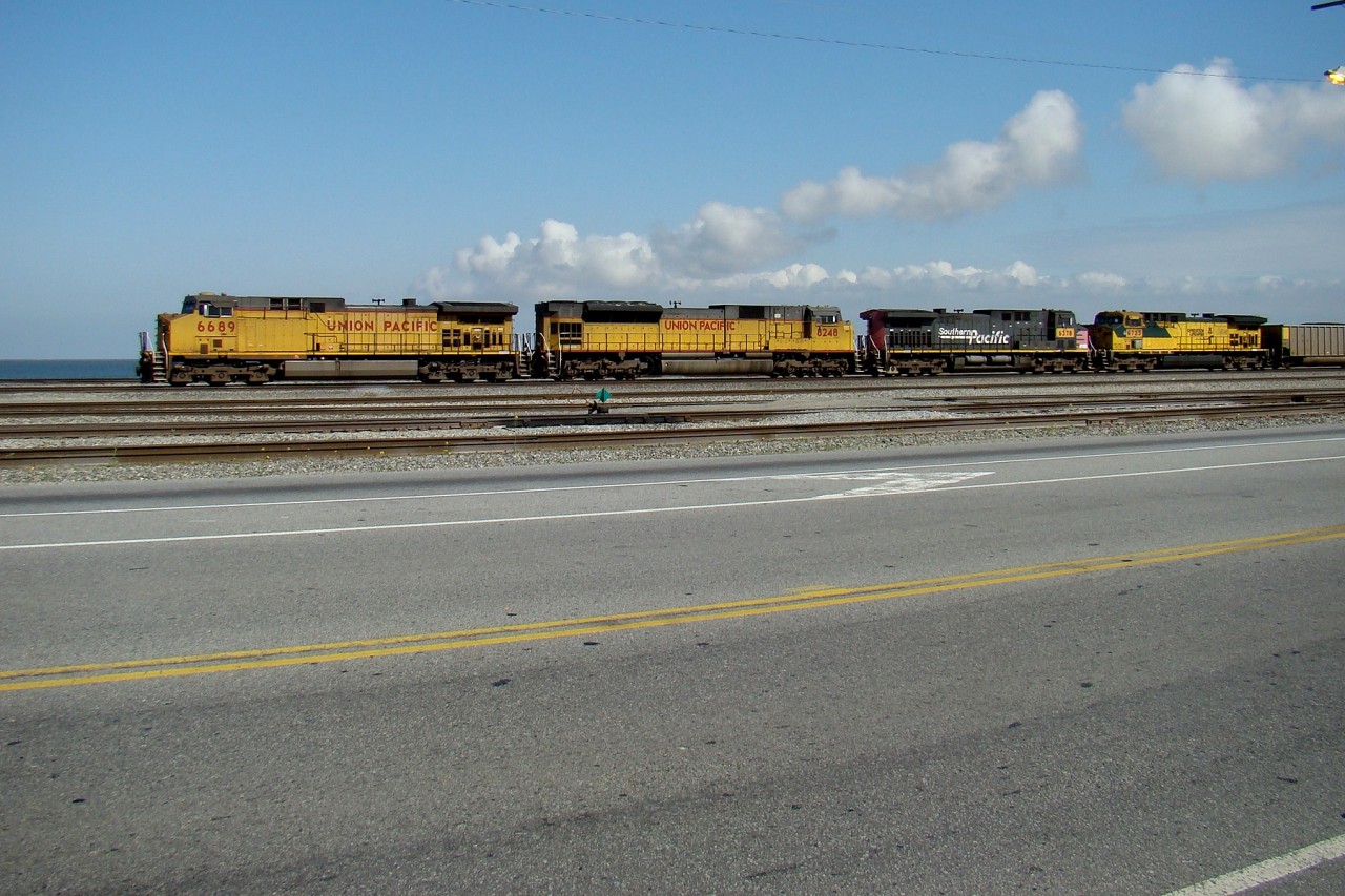 AC4400CW 6689, SD9043MAC 8248, AC4400CW 6378, and AC440CW 6723 wait to unload their train at Westshore Terminals coal export facility.