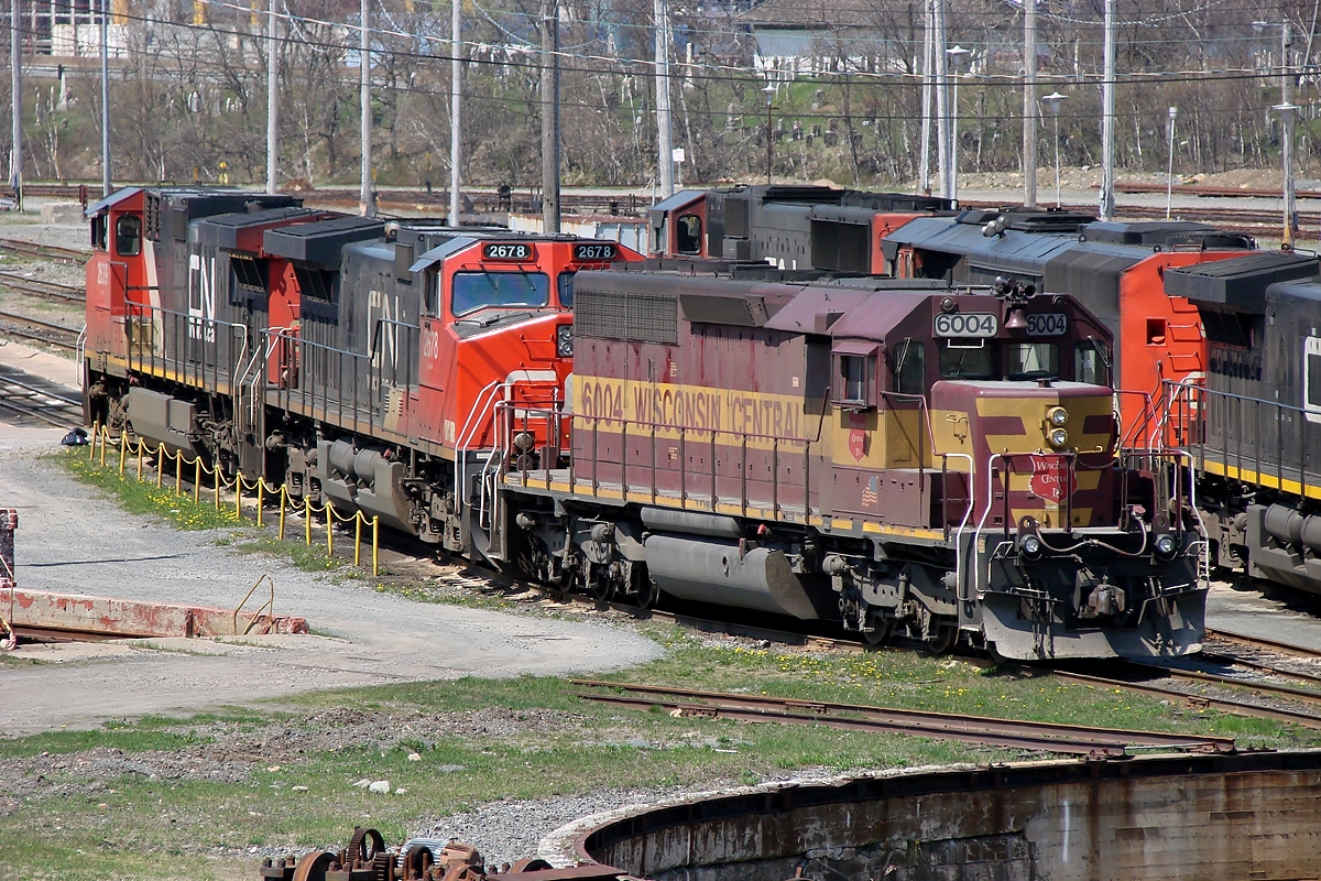 Wisconsin Central 6004, former Algoma Central 186, waits in Fairview for its evening departure on train 149.