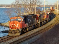 CN 5756, C44-9W 2551, C44-9W 2525, and a third C44-9W prepare to depart Rockingham Yard with Toronto bound CN 121.