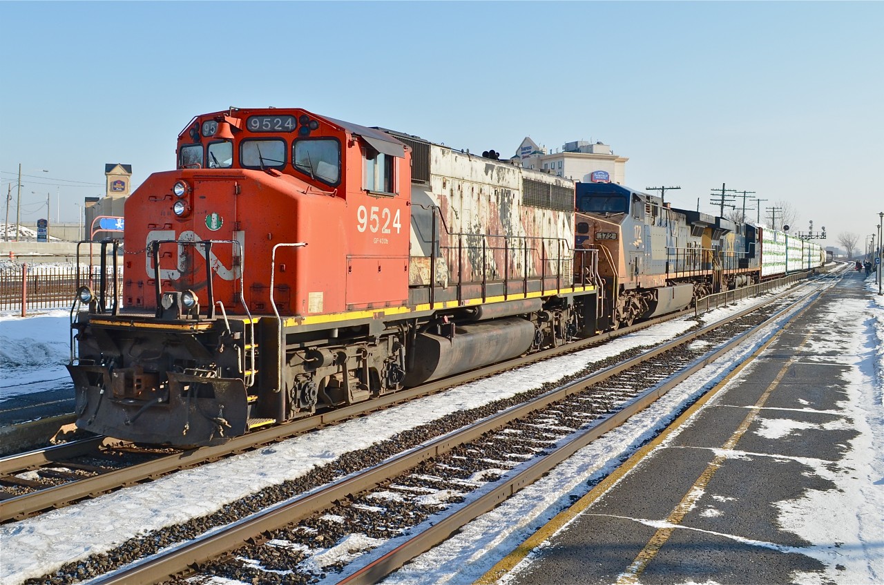A surprise was a CN GP40-2L(W) on the head end of CN 327 which normally has 100% CSX power as it heads for CSX rails in upstate New York. It was a longer train than usual, apparently it had a large setout at Coteau. Perhaps the geep was dropped there. Lashup was CN 9524, CSXT 172, CSXT 5343. For more train photos, click here.