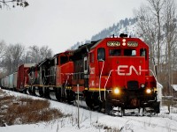 Snow is about to fall as CN(WC)3027 leads four units and eight wagons into Lavington. They will pick up a load of lumber @Tolko Industries and return to Kamloops later in the day.