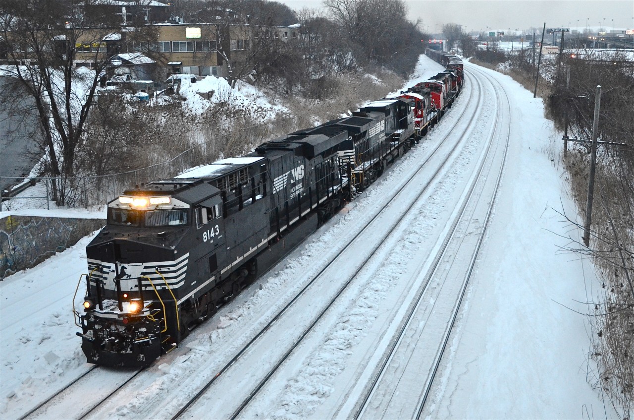 This was unusual..... CN 527 is a local transfer and usually has 2-5 geeps. Today it had the power from CN 529 (NS 8143, a less than year old ES44AC & NS 9739) as well as 5 geeps (CN 7226, CN 9410, CN 4719, CN 7275 & CN 7062). For more train photos, check out http://www.flickr.com/photos/mtlwestrailfan/