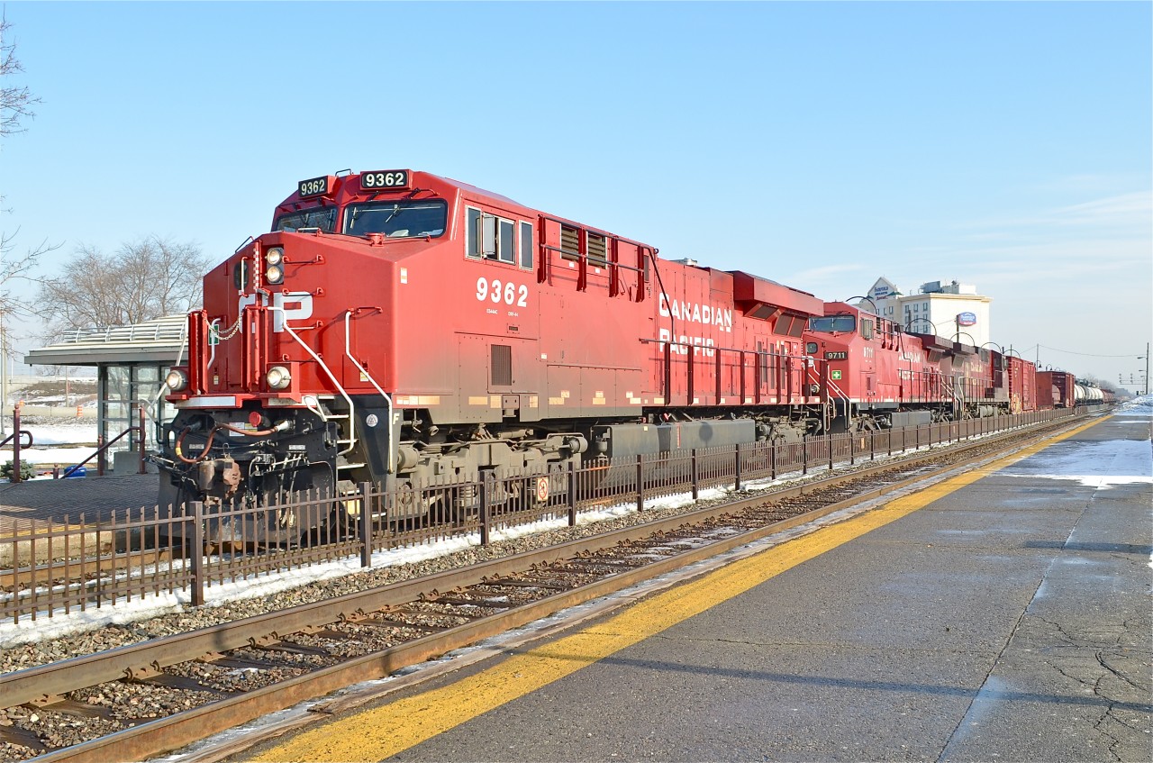 CP 119 had 3 units at the head end (CP 9362, CP 9711, CP 9626) and a rear DPU (CP 9588) and was one massive train. CP 9711 is a AC4400CW that was refurbished and repainted last year. For more train photos, click here.