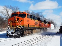 I finally managed to catch some of the foreign power that's been running around lately in the form of CN U721 with BNSF 6031 and BNSF 9255 (filled out with mixed freight on the head end of course). Detouring VIA 84 on the south track was at the west of the platform when the photo was taken, so another few seconds later and all I would have gotten was a cloud of snow. Train 393 following 721 also had a pair of BNSF units for power. 