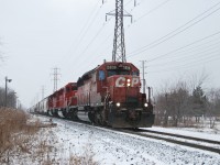 On a cold last day of 2013 I decided to go out train watching with my buddies at Optimist park for a bit to test to my new video camera. This was the only train I caught, I got there late and my friends caught T-25 & 609, anyways this train had 2 sister units CP 5009 & CP 5008 both rebuilt SD40-2's now those SD30C-ECO things. The train pulled past us a bit then got the green to back into Windsor yard. It was a cool sight to see with the rebuilt engines and defiantly worth waiting in the cold for them! 5009 wad a missing number board for some reason, don't know why. But it was cool to see these rebuilt engines!