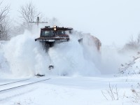 Work Plow 2303 tackles some drifts while its heads east out of Baden. Following 15 minutes behind is VIA 84, which is running a little over 4hrs behind schedule. 