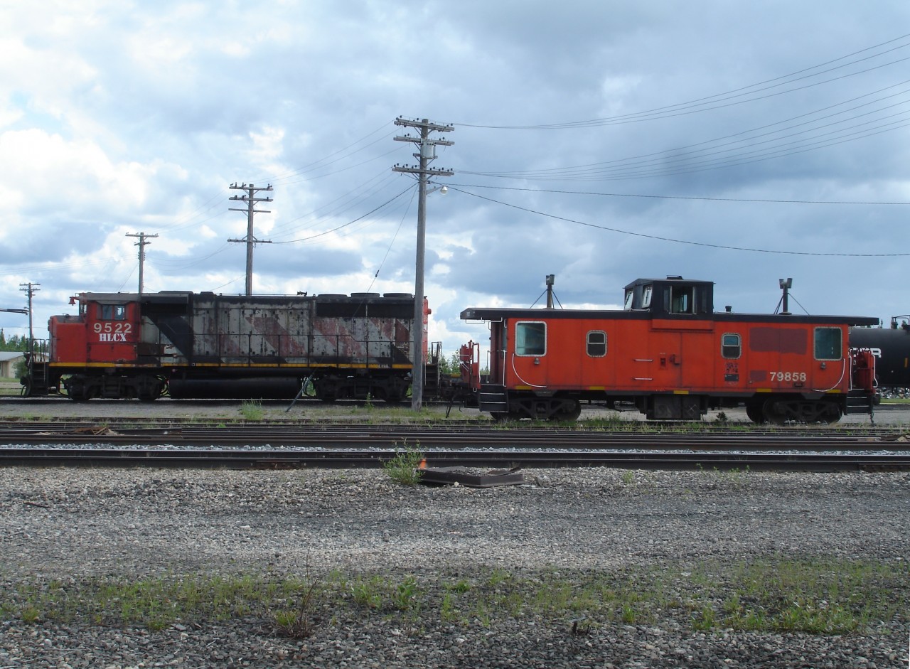[Editors note: Very remote location, few photos of HBRY on site] Ex-CN GP40-2LW 9522 has been patched by Helm Financial and sent to Gillam to keep ex-CN Pointe St. Charles van 79858 company for a while. 9522 is a 1974 built unit while the van is a few years younger with a 1976 birth date.