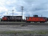 [Editors note: Very remote location, few photos of HBRY on site] Ex-CN GP40-2LW 9522 has been patched by Helm Financial and sent to Gillam to keep ex-CN Pointe St. Charles van 79858 company for a while. 9522 is a 1974 built unit while the van is a few years younger with a 1976 birth date.