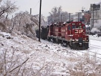 A pair of GP9s depart Toronto Yard after the 2013 Ice Storm.