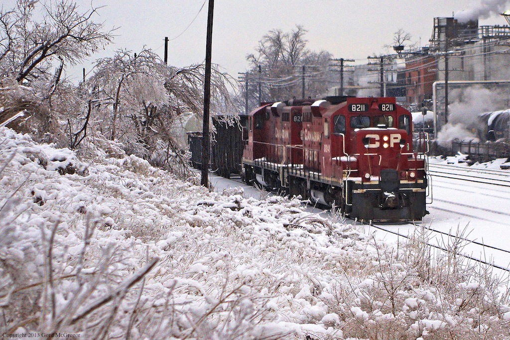 A pair of GP9s depart Toronto Yard after the 2013 Ice Storm.