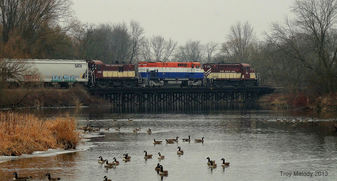 I photo opportunity that i have been waiting for. Rs18u 181, M420 647, and Rs23 505 lead a cut of hoppers into Guelph form Cambellville. There is no better sound then the roar of Alco engines piercing the silence following several blasts of the horn from a friendly crew who had noticed that they were being photographed.