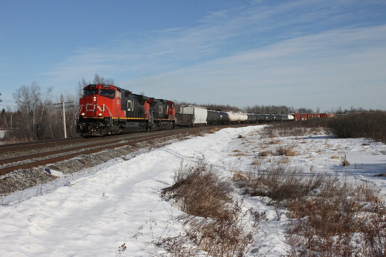 CN 407 with a relatively clean 2568 leads the 2680 and over 5000ft of tonnage for Gordon Yard in Moncton, NB. Shot with Canon Rebel T3 with 18-55mm lens