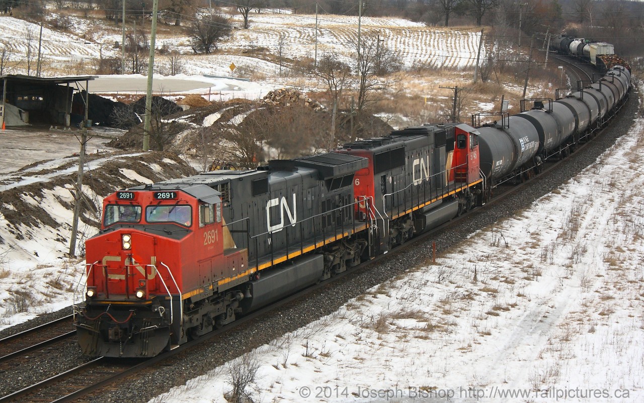 CN 331 rounds the bend at Garden Avenue on the outskirts of Brantford with CN 2691 and CN 5746 in charge of a small train.