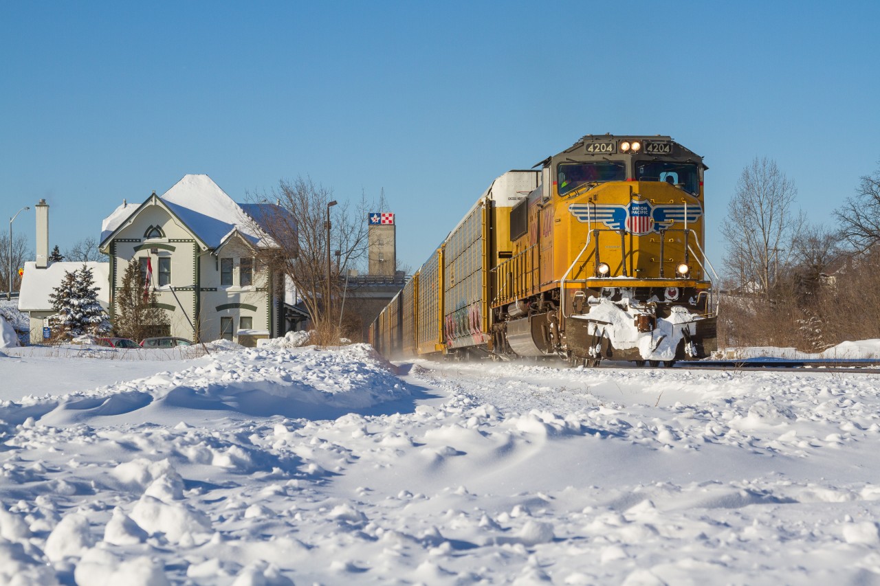 Western Invader in Woodstock!. A handsome Union Pacific (London-built) EMD SD70M guides train 276 through a snow-covered Woodstock with a healthy string of racks for Oakville. For the first time ever, I was able to shoot Union Pacific leading in Ontario!