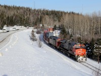 A detoured Q111 rolls through Ripple, Ontario running from Reynolds/Boyne to Thunder Bay on the CP.