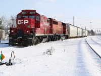 CPs Streetsville turn has just arrived at Streetsville yard after not running to the yard the previous day due to poor weather. The local is led by a pair of endangered locomotives on CPs roster as the railroad is gradually purging most of its GP9s and GP40s. The 8250 was originally rebuilt into a yard switcher with its dynamic brakes removed but was renumbered and re-geared into a road unit a number of years ago when CP required more road units. GP40 4657 came to CP from HELM Leasing a number of years ago in faded B&M blue and has outlived most of its sister former Guilford units that were acquired at that time.