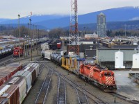 The Sumas Turn heads east out of the yard on it way to Abbotsford to interchange with SRY and BNSF along with a few skeleton cars for Kanaka creek pole co.