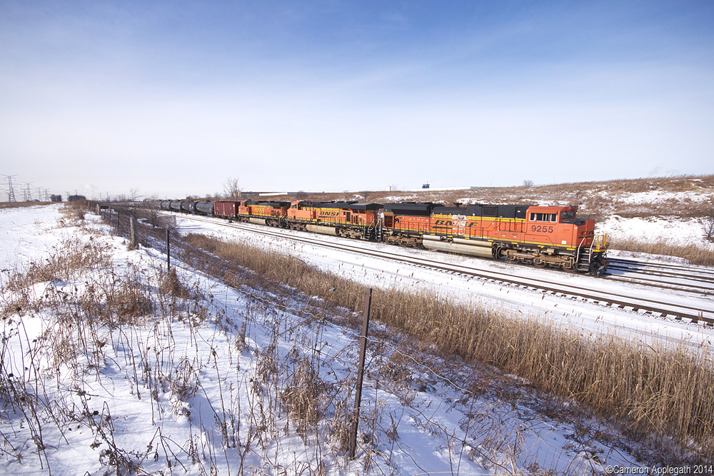 B is for Birthday...and BNSF. Today I turn 20, and what better a gift than a 710 lead by sole BNSF. Here the tanker revs past the east entrance to MacMillan Yard with 9255, 6031, 4462. Here's to the big two-O.